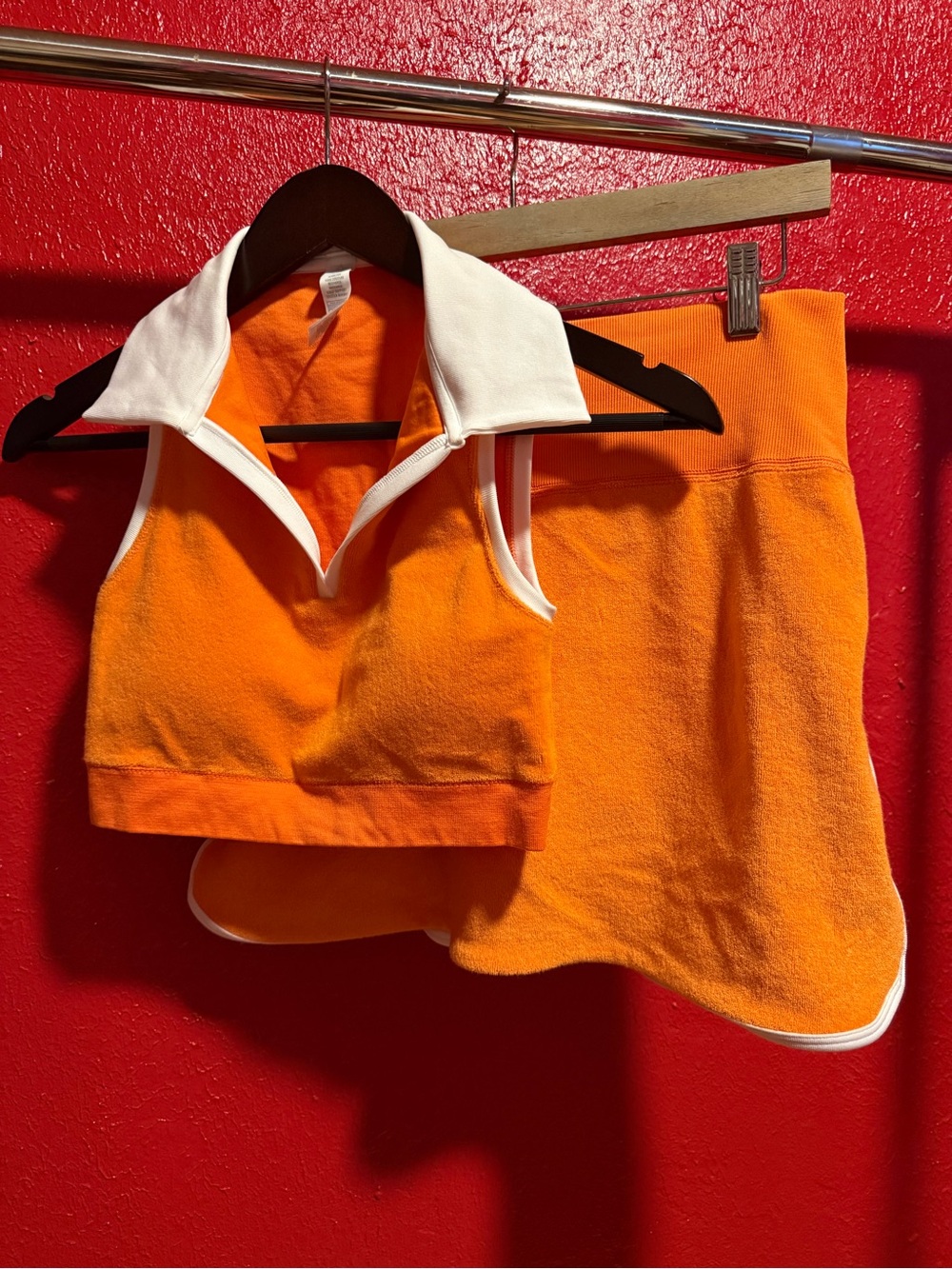 74. Preloved Orange Two-Piece Sleeveless Collar Crop Top and Skort Set